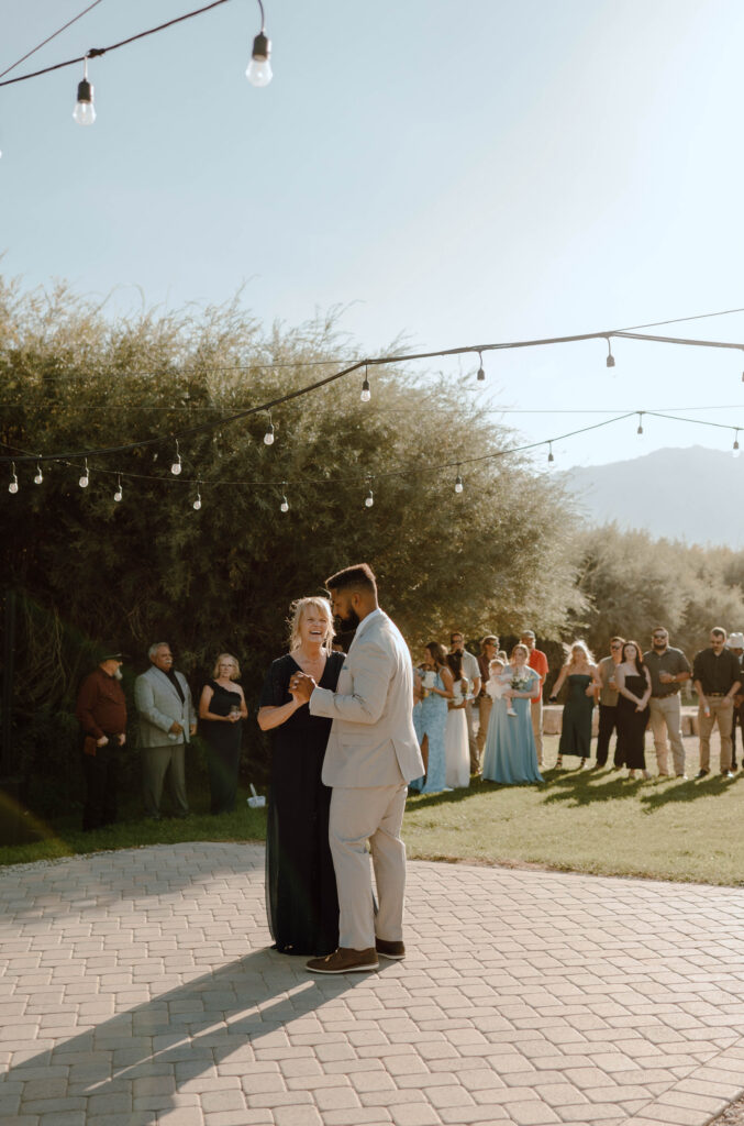 Groom dancing with his mother.